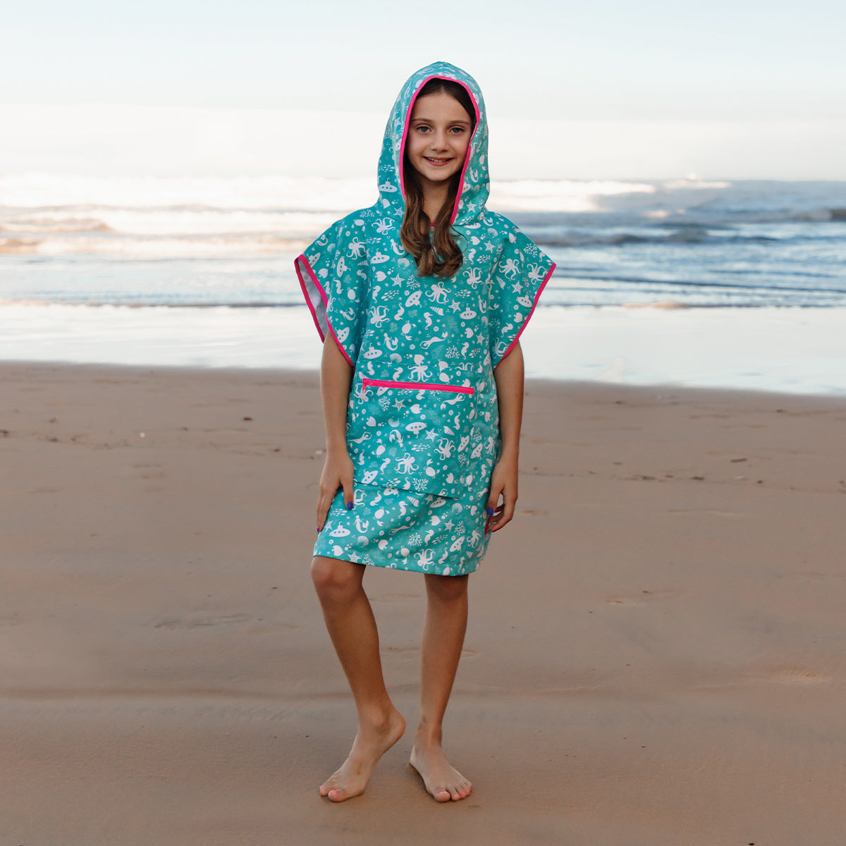 Kids beach poncho towel for travel, holidays and camping | neon pink trim Hooded Owls Ltd Kids beach poncho towel for travel, holidays and camping | neon pink trim Hooded Owls Ltd