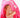 Child hiding under the hood of her standard pink hooded towel with Unicorns trim