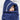 Child laying on bed with navy blue hooded towel with Dinosaurs trim