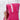Child wearing pink hooded towel with mermaid trim around the hood blowing bubbles