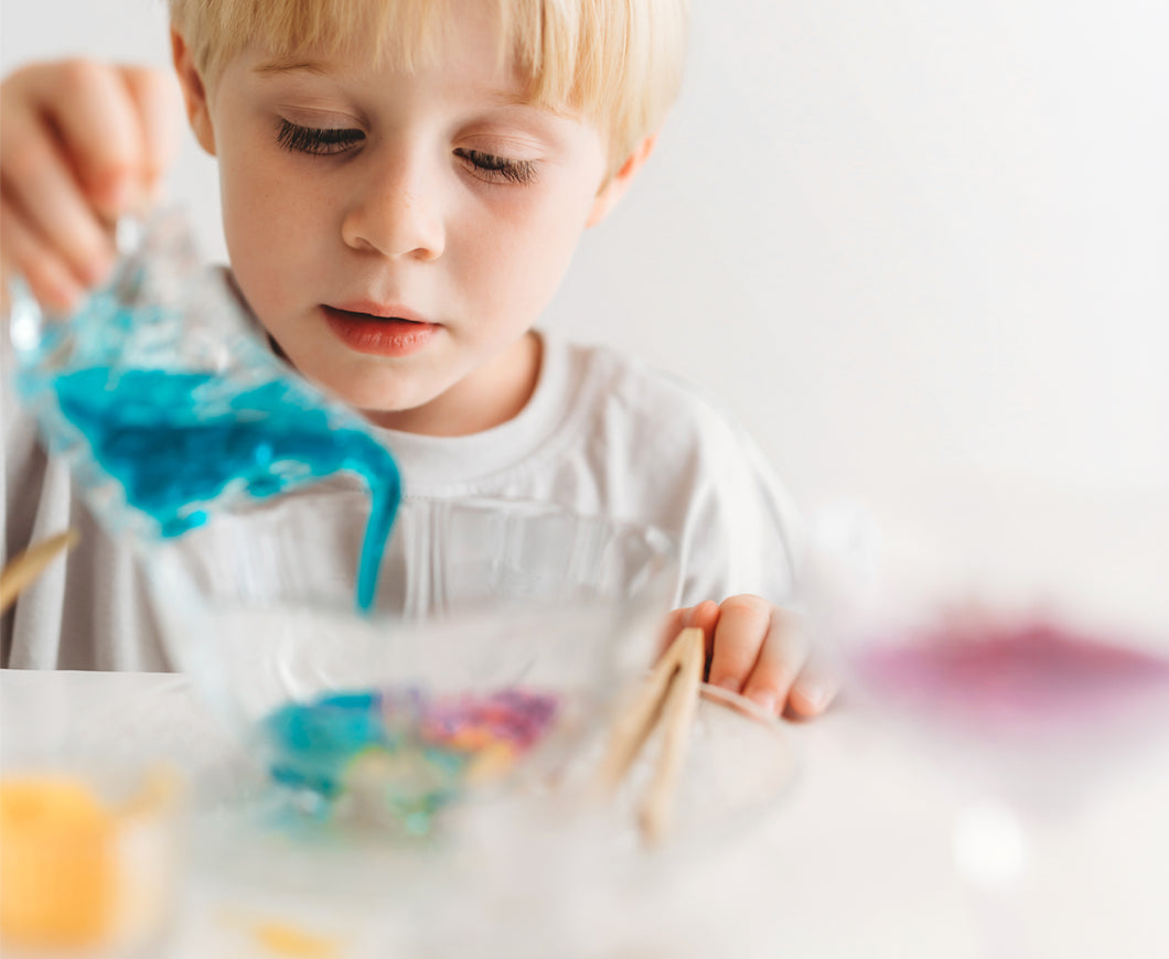 Boy absorbed in potion play