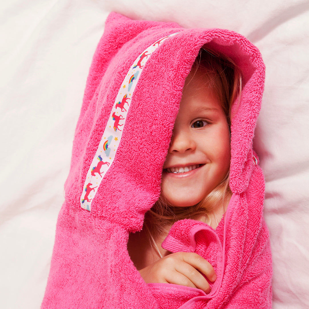 Baby wrapped in a hooded towel